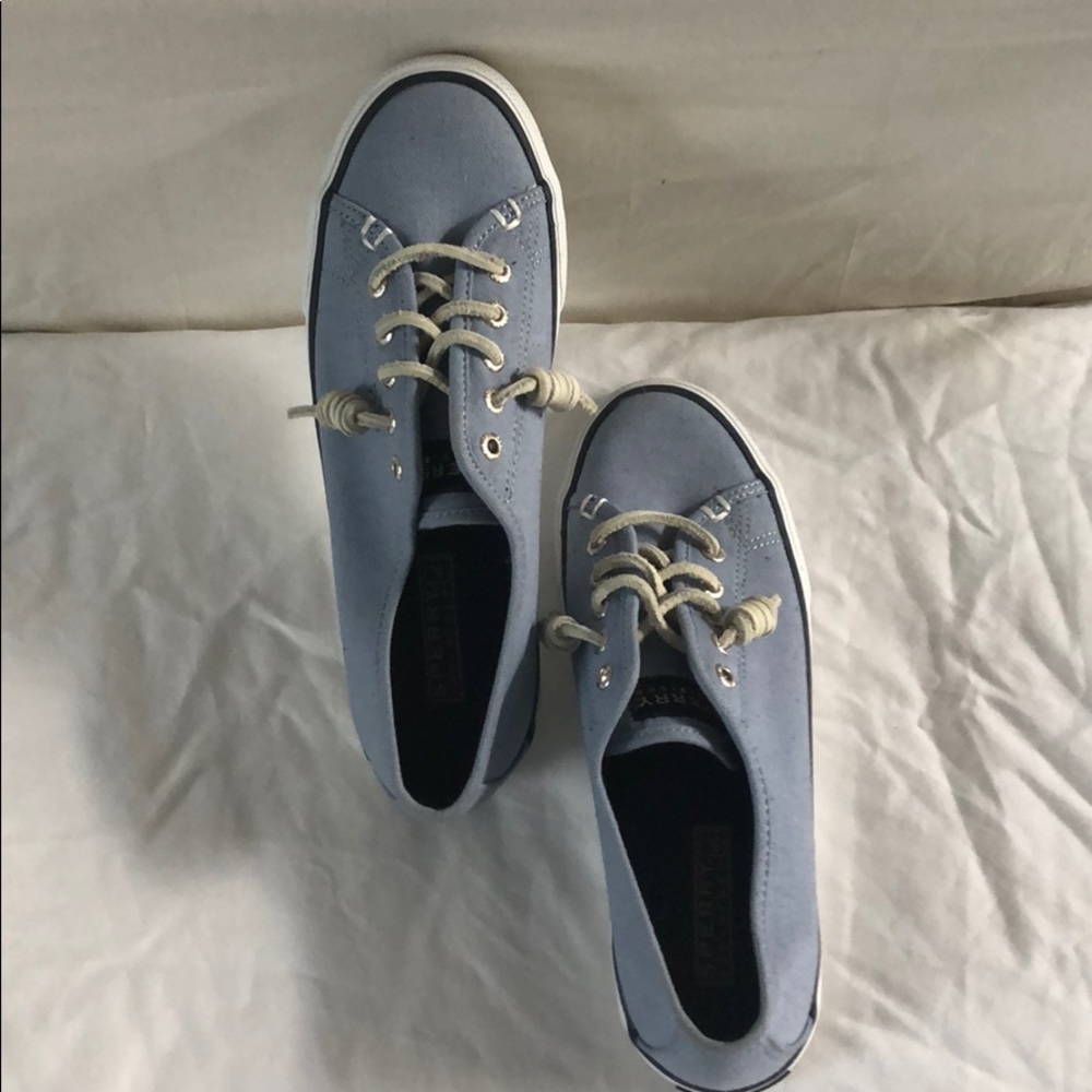 Size 5.5 women’s canvas Sperrys. Never worn.